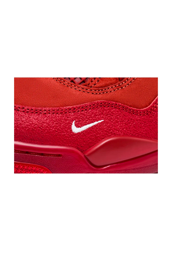 Sneakers Air-Jordan-4-Brick-By-Brick-Nigel-Sylvester rossa logo nike