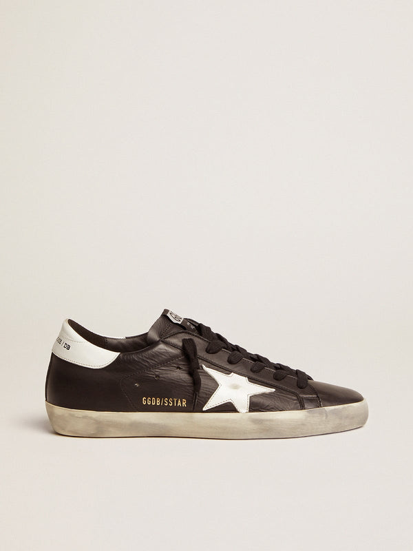 Sneaker Basse Golden Goose Super Star Black Leather con stella bianca e tallone bianco
